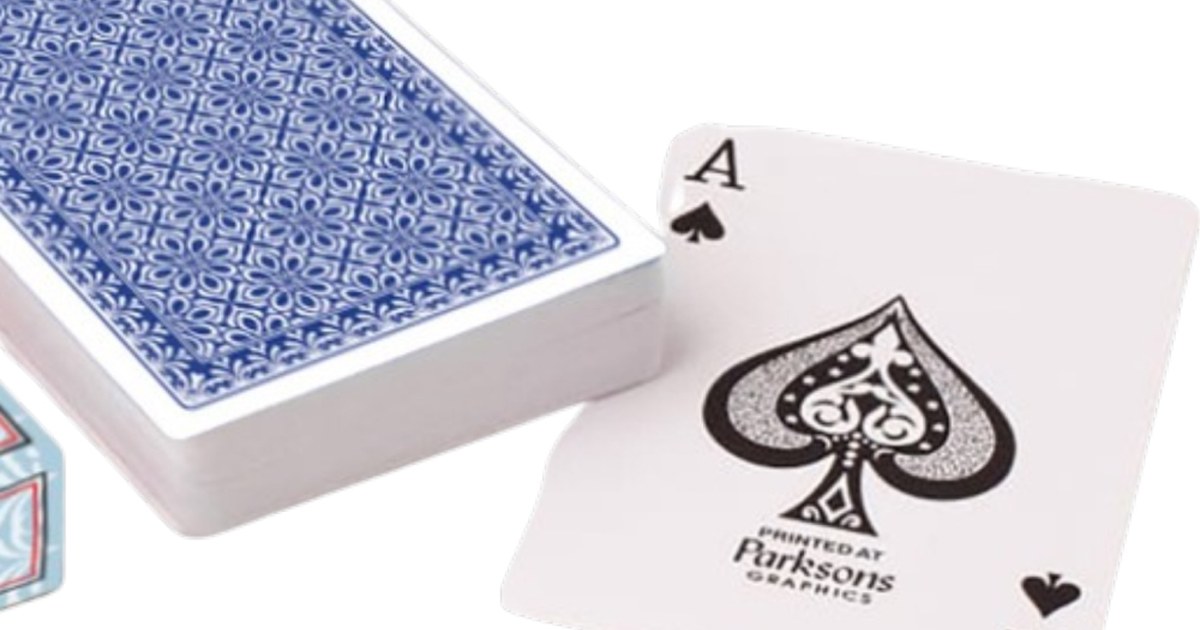 575 nylon plastic and premium paper playing cards side by side